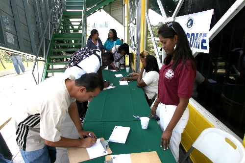  Visitors register to view booths at San Fernando Open Day