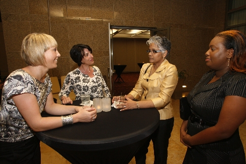 Alison Curbishley, University of Sunderland (UOS), Vivian Kinnard UOS, Denise Chatoor SBCS, and Kandace Sayers SBCS enjoy a light moment