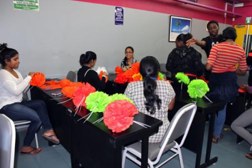 Staff and students prepare Divali decorations