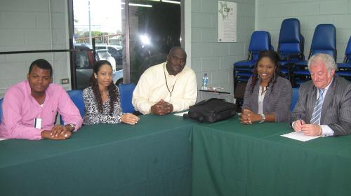 Mr Brooks meeting with Keon Jeffery, Lynelle Fyzool, Derron Dickson, and Delicia Patterson - students at the Champs Fleurs Campus