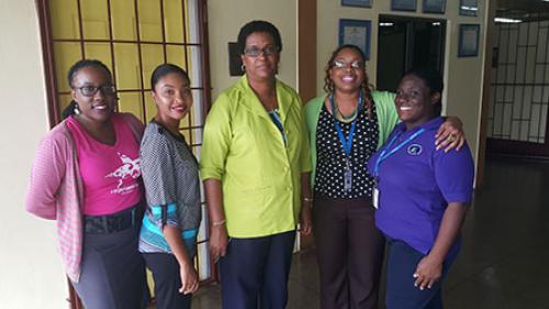 Trincity Campus staff with the Principal of Dinsley Government Primary School