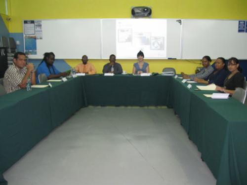 Ms. Abigail Smith (centre) with staff and lecturers.